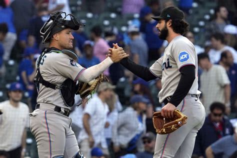 Marlins stop 5-game slide with 14-inning win over Cubs